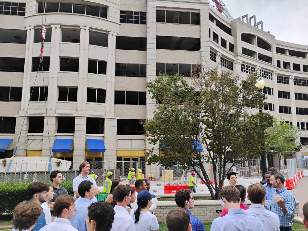 GRA students touring an office to residential conversion project in DC led by Lowe and Henderson Park real estate firm.
